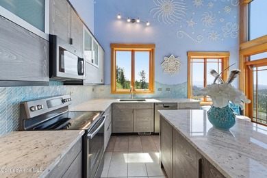 Commanding one of the most breathtaking settings in North Idaho - photo 16