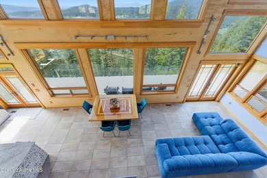 Commanding one of the most breathtaking settings in North Idaho - photo 21