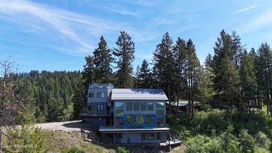 Commanding one of the most breathtaking settings in North Idaho - photo 42