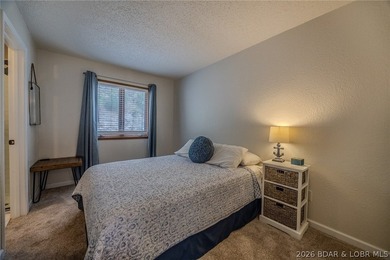 Welcome to 14 Bentwood Dr at the 3 Mile Marker of the Lake of - photo 24