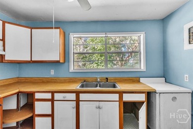 MOTIVATED SELLER! This cozy lakeside property sits on a generous - photo 8
