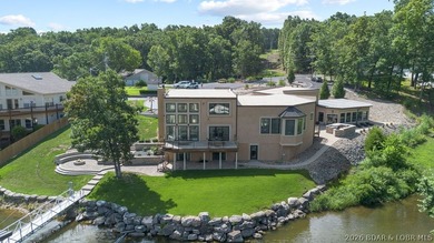 Luxury lakefront home located in a highly sought-after cove at - photo 13