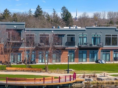 Modern riverfront living in the heart of downtown Lowell. This - photo 22