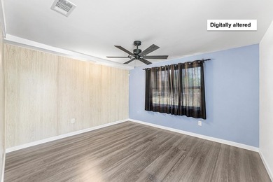 4BR/2BA single-family home with 1,707 sq. ft. under air. This - photo 6