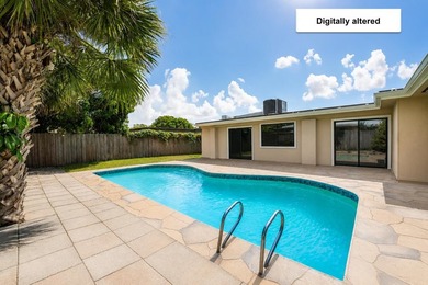4BR/2BA single-family home with 1,707 sq. ft. under air. This - photo 9