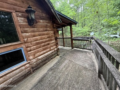 Tucked away on a private wooded setting just minutes from Lake - photo 11