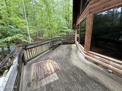 Tucked away on a private wooded setting just minutes from Lake - photo 12