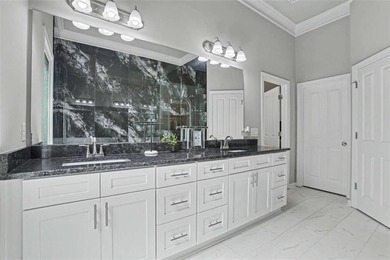 Experience elevated living in this exquisitely updated endunit - photo 14