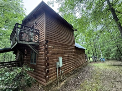 Tucked away on a private wooded setting just minutes from Lake - photo 14