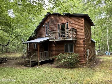 Tucked away on a private wooded setting just minutes from Lake - photo 15