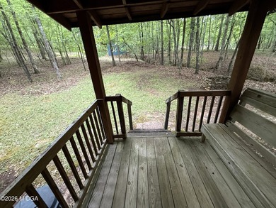 Tucked away on a private wooded setting just minutes from Lake - photo 16