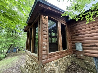 Tucked away on a private wooded setting just minutes from Lake - photo 17