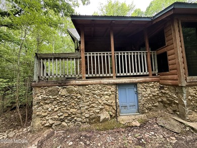 Tucked away on a private wooded setting just minutes from Lake - photo 18