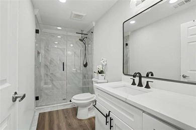 Experience elevated living in this exquisitely updated endunit - photo 21