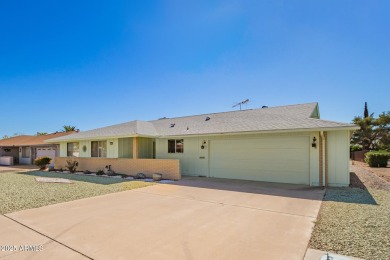 Enjoy the relaxed Arizona lifestyle in this spacious 1,699 sq ft