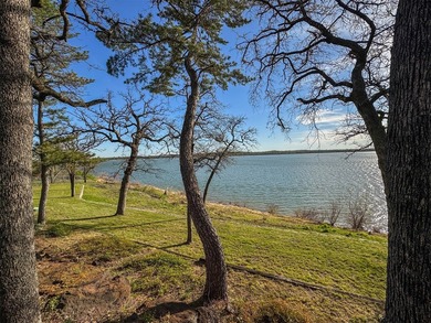 Set high above the shoreline on a commanding bluff, this rare 1 - photo 11