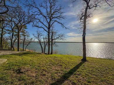 Set high above the shoreline on a commanding bluff, this rare 1 - photo 12