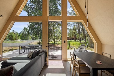 Situated on a rare and wooded 0.81-acre lot in Donnelly, only 10 - photo 13
