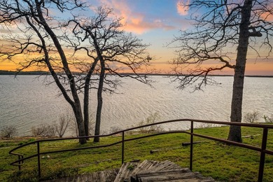 Set high above the shoreline on a commanding bluff, this rare 1 - photo 17