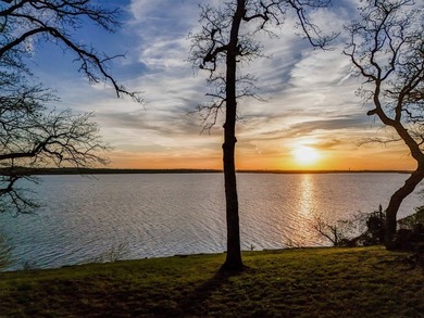 Set high above the shoreline on a commanding bluff, this rare 1 - photo 21