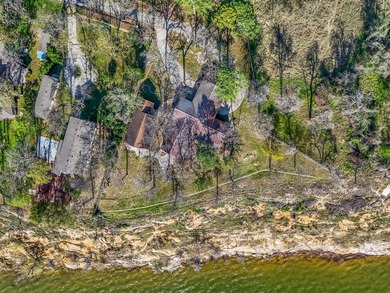 Set high above the shoreline on a commanding bluff, this rare 1 - photo 22