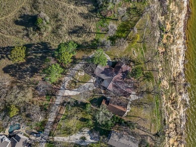 Set high above the shoreline on a commanding bluff, this rare 1 - photo 23