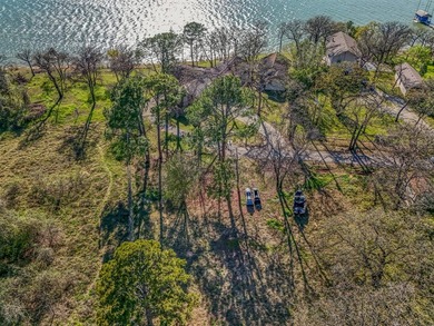 Set high above the shoreline on a commanding bluff, this rare 1 - photo 25