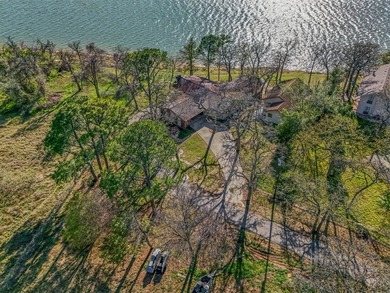 Set high above the shoreline on a commanding bluff, this rare 1 - photo 26