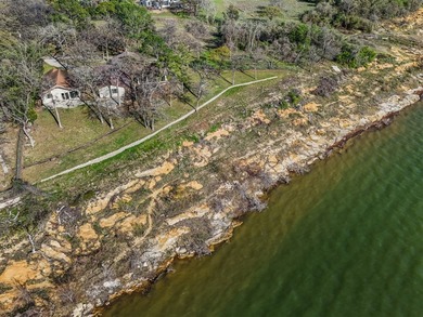 Set high above the shoreline on a commanding bluff, this rare 1 - photo 29