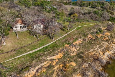 Set high above the shoreline on a commanding bluff, this rare 1 - photo 30