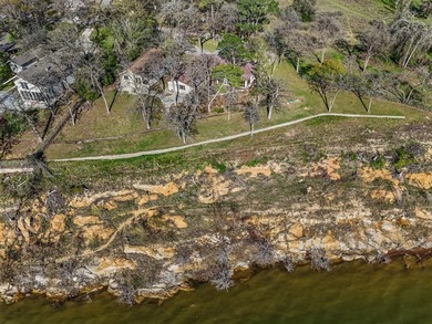 Set high above the shoreline on a commanding bluff, this rare 1 - photo 31
