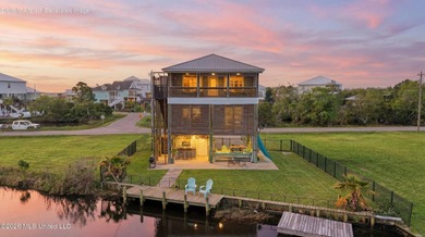 Waterfront living meets coastal charm in this beautifully - photo 2