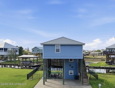 Waterfront living meets coastal charm in this beautifully - photo 3