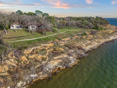 Set high above the shoreline on a commanding bluff, this rare 1 - photo 33