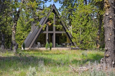 Situated on a rare and wooded 0.81-acre lot in Donnelly, only 10 - photo 34