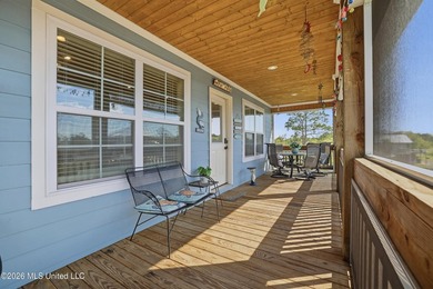 Waterfront living meets coastal charm in this beautifully - photo 6