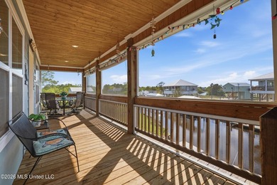 Waterfront living meets coastal charm in this beautifully - photo 7