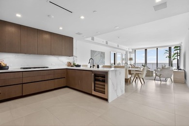 Stunning Southeast corner beachfront residence at Solemar with a