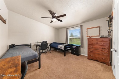 This spacious 4-bedroom, 2-bathroom home sits on an impressive - photo 34