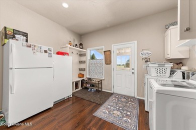This spacious 4-bedroom, 2-bathroom home sits on an impressive - photo 35