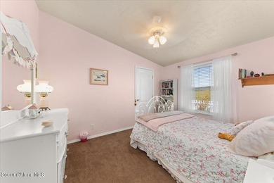 This spacious 4-bedroom, 2-bathroom home sits on an impressive - photo 42