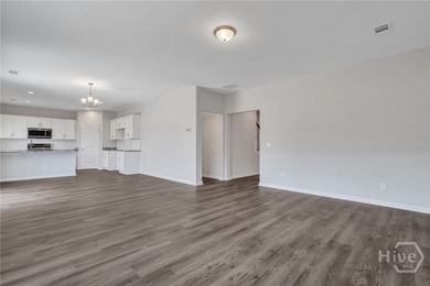 The Cypress floorplan by Smith Family Homes is under - photo 8