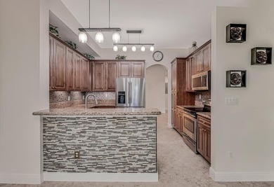 This lake front coach home has a brand-new roof, new AC with - photo 17