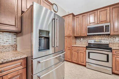 This lake front coach home has a brand-new roof, new AC with - photo 23