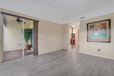 This lake front coach home has a brand-new roof, new AC with - photo 25