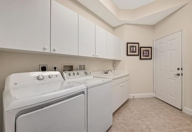 This lake front coach home has a brand-new roof, new AC with - photo 30
