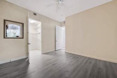 This lake front coach home has a brand-new roof, new AC with - photo 32