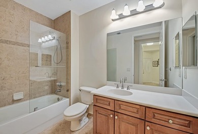 This lake front coach home has a brand-new roof, new AC with - photo 34