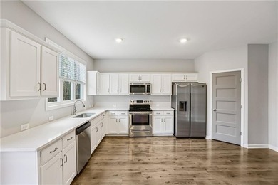 Welcome to 91 Richmond Dr, a home that boasts a kitchen equipped - photo 19