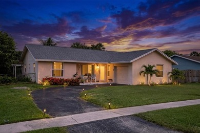 Welcome to this charming 3-bedroom, 2-bath single-family home in - photo 1